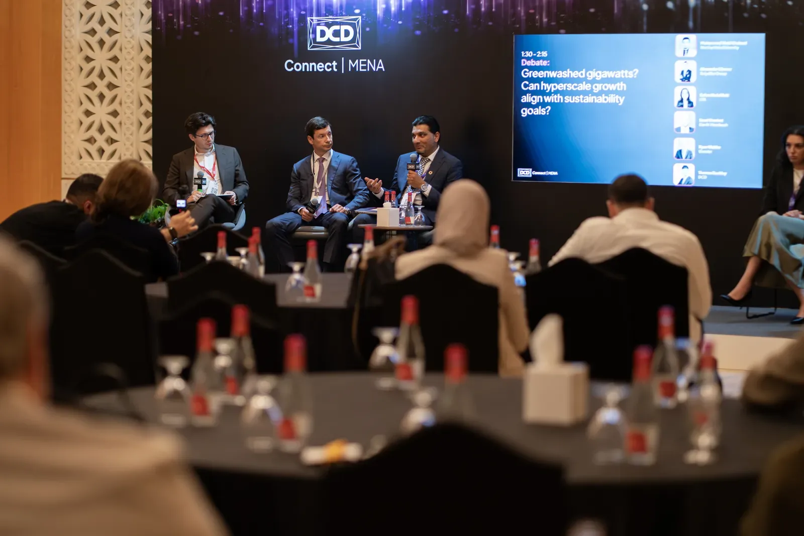 Panel and audience at a conference, photographed by Pixer